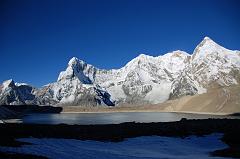 28 Ice Tooth, Nyanang Ri, Pungpa Ri, Shishapangma East Face, Phola Gangchen And Kong Tso Early Morning Ice Tooth (6200m), Nyanang Ri (7071m), Pungpa Ri (7445m), Shishapangma (8012m) East Face, Phola Gangchen (7716m) and Kong Tso as we start our trek towards Ngora.